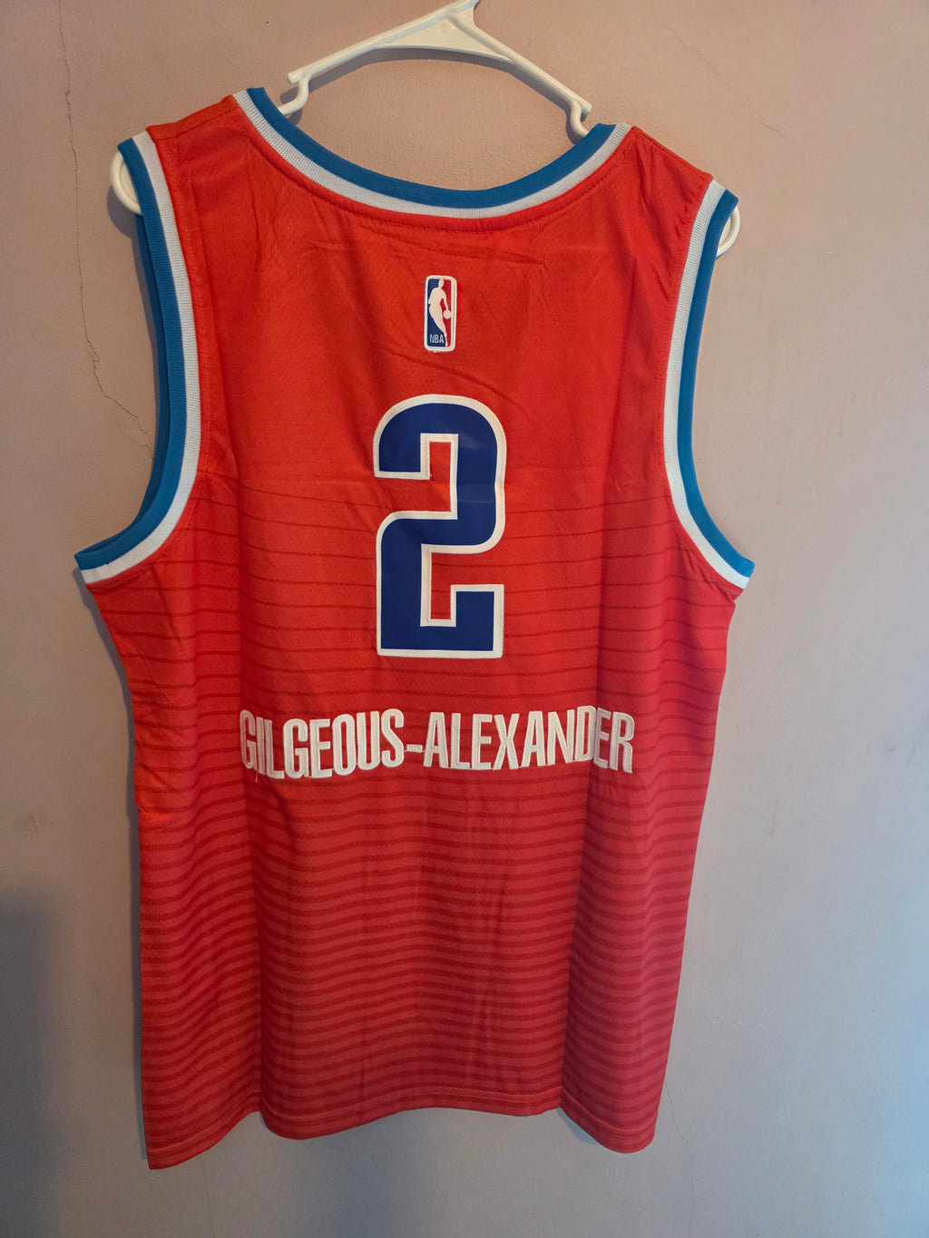 Unisex Oklahoma City Thunder 
Shia Gilgeous-Alexander Jordan Brand Orange 
Swingman Jersey 
Statement Edition