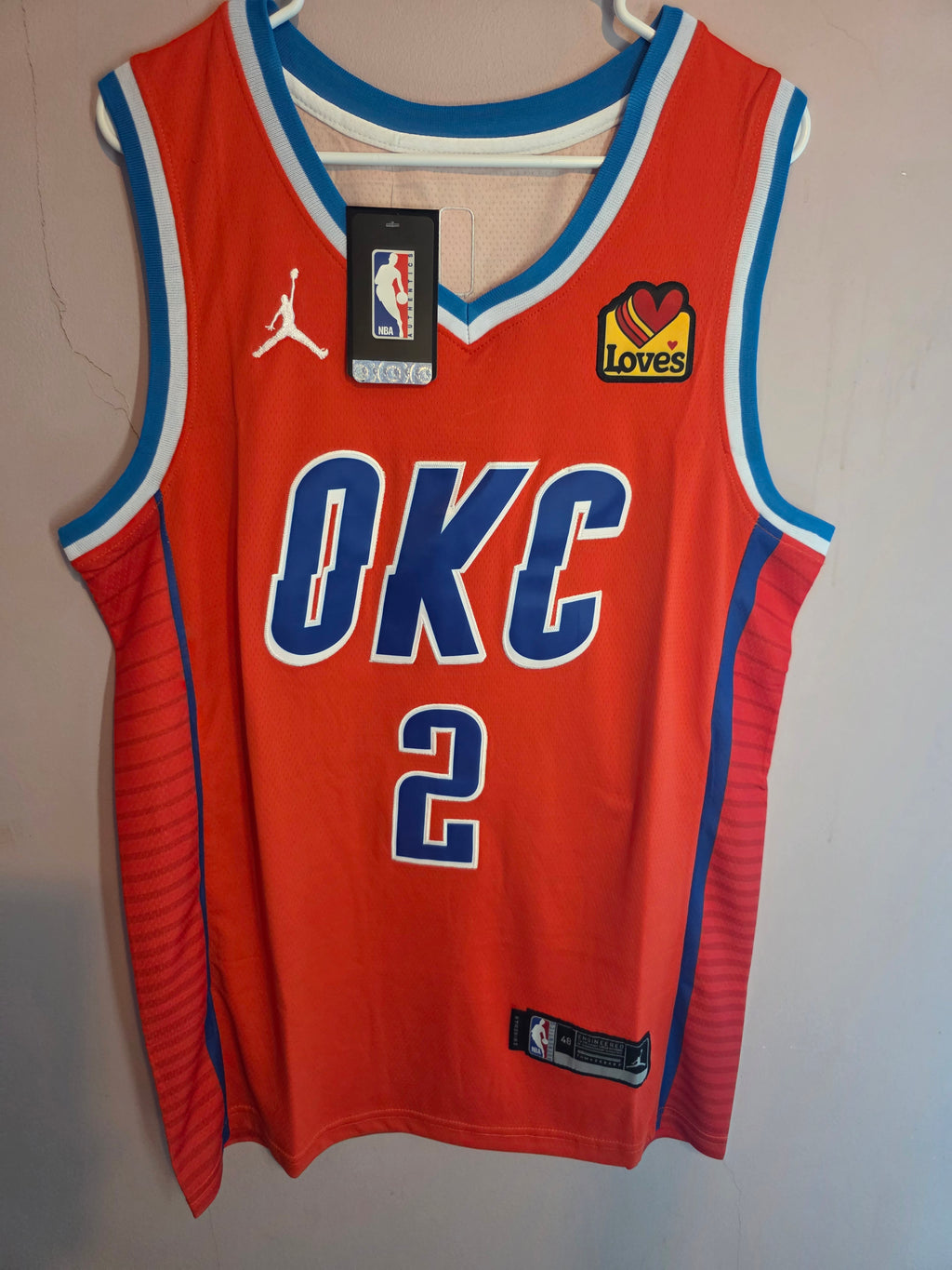 Unisex Oklahoma City Thunder 
Shia Gilgeous-Alexander Jordan Brand Orange 
Swingman Jersey 
Statement Edition